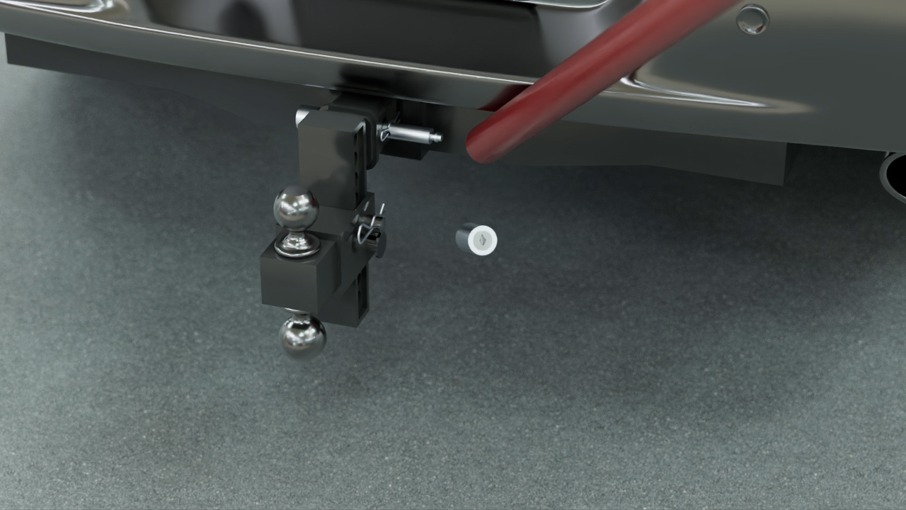 Hitch Pin Guard installed on a drop hitch
